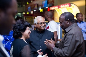 “Minister for Information, Culture, Arts and Sports Dr Harrison Mwakyembe (right) having a chat with Prof. Issa Shivji (centre) and other invited guests at the occasion of the T- junction premier” 2017